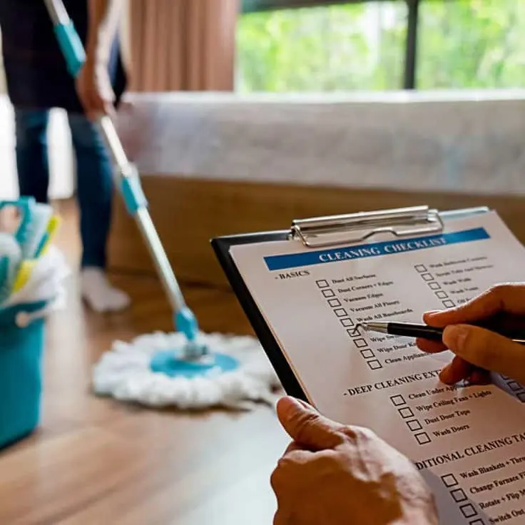 A cleaning checklist on hand.