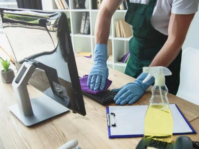 Disinfecting a keyboard and mouse in an office in Cork