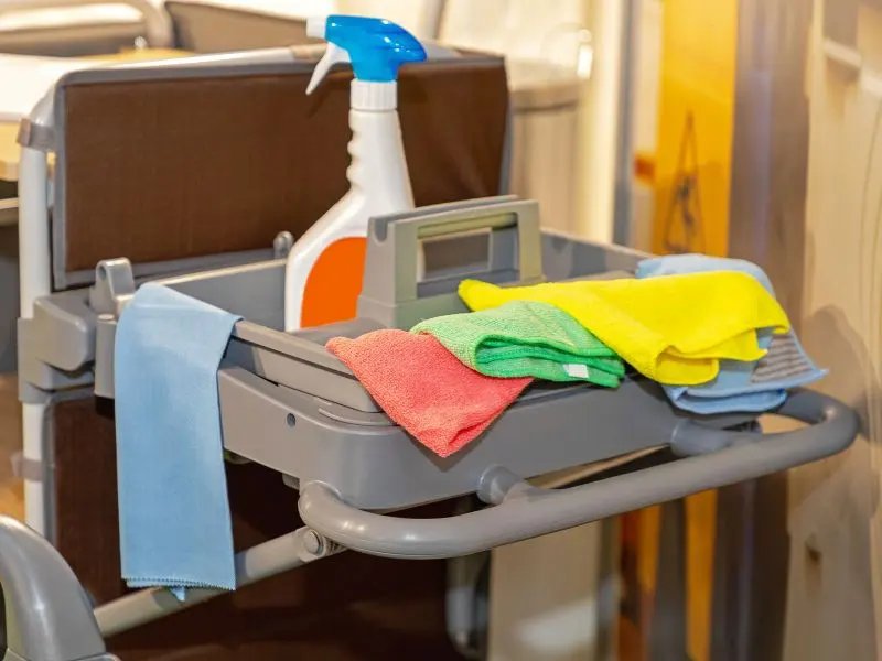 Using a microfiber cloth for streak-free window cleaning