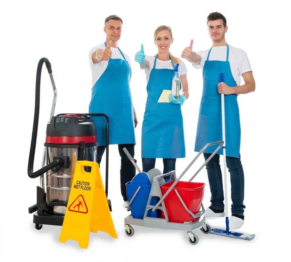 Three cleaners in blue aprons give thumbs up, holding a mop, spray bottle, and vacuum. "Caution: Wet Floor" sign and cleaning supplies visible.